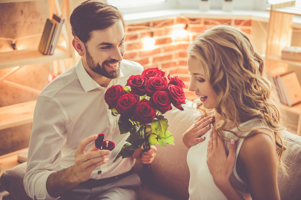 Handsome elegant guy is proposing to his beautiful girlfriend - How to Get a Libra Man to Marry You