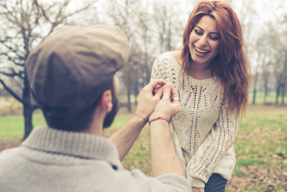 couple in love marriage proposal at the park winter - How to Get a Libra Man to Marry You